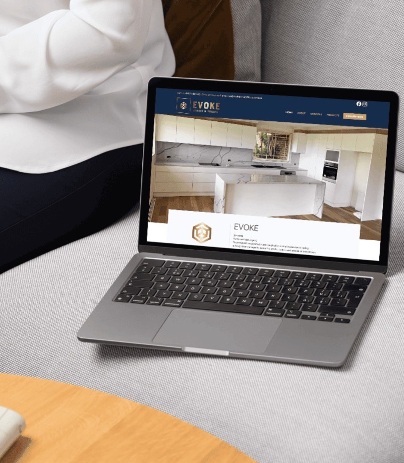 Evoke Cabinets & Joinery website displayed on a laptop