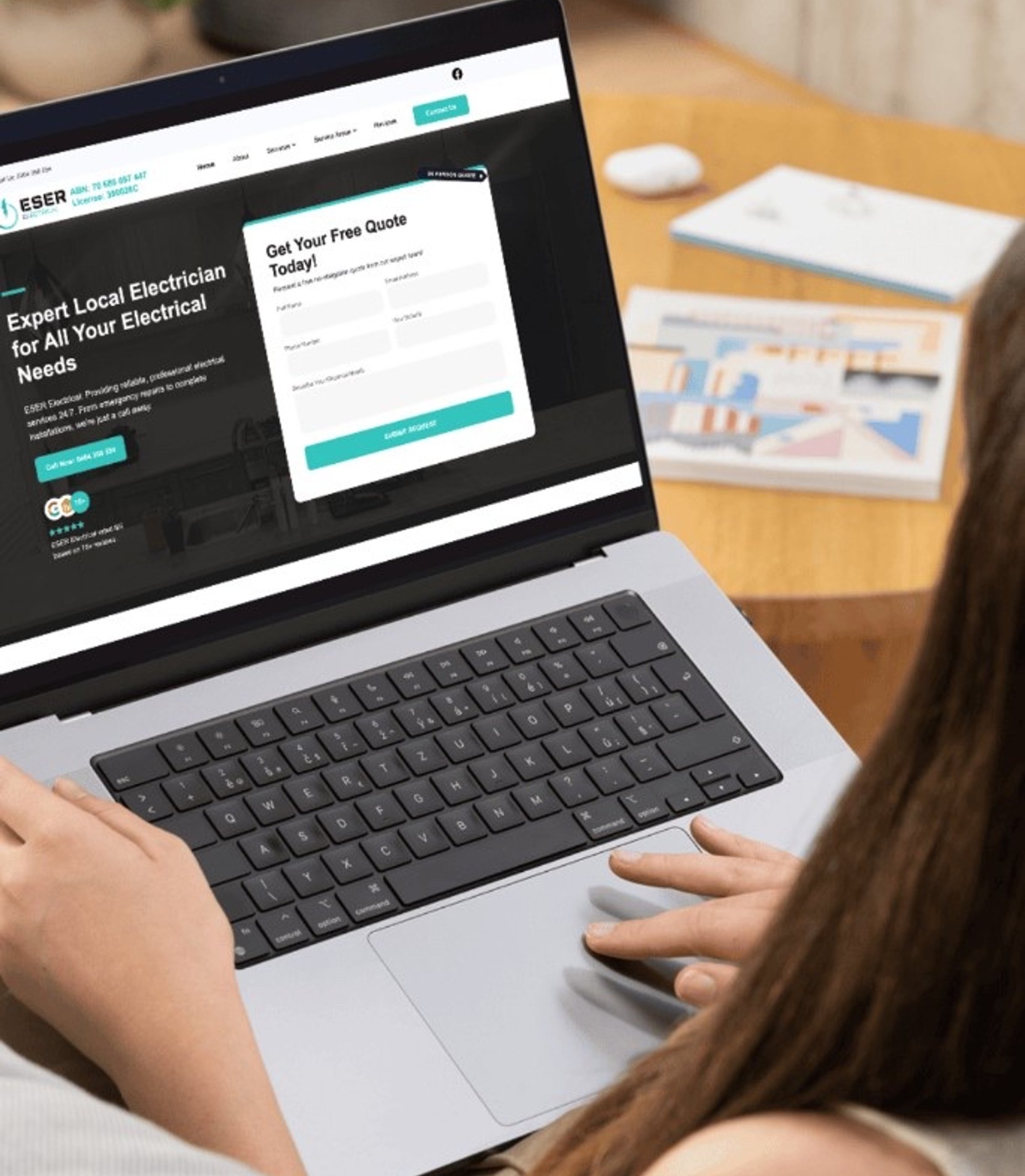 ESER Electrical website displayed on a laptop